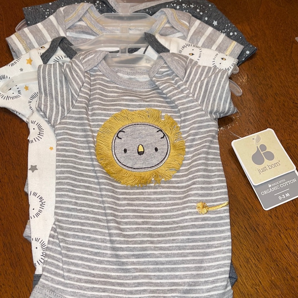 4 pack “LIL LION” bodysuits